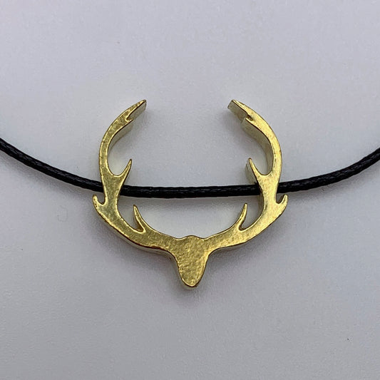 Brass antlers pendant on black cord