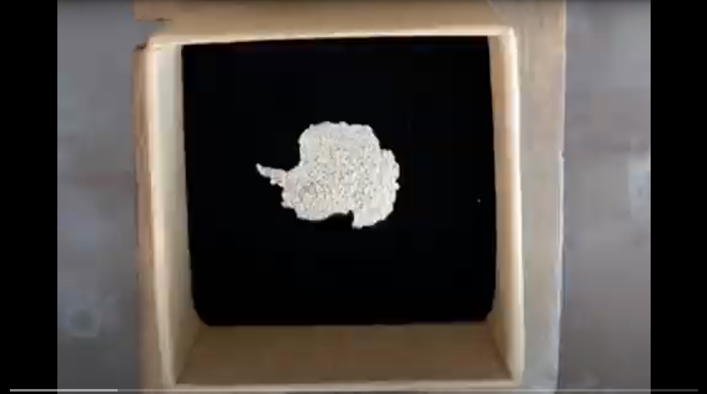 Load video: Video showing making of bespoke cufflinks and tie pin in the shape of Antarctica